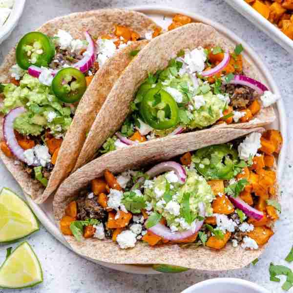 {NEW!} Sweet Potato & Black Bean Tacos Taco ’bout a flavor explosion! These vibrant, nutritious, and...