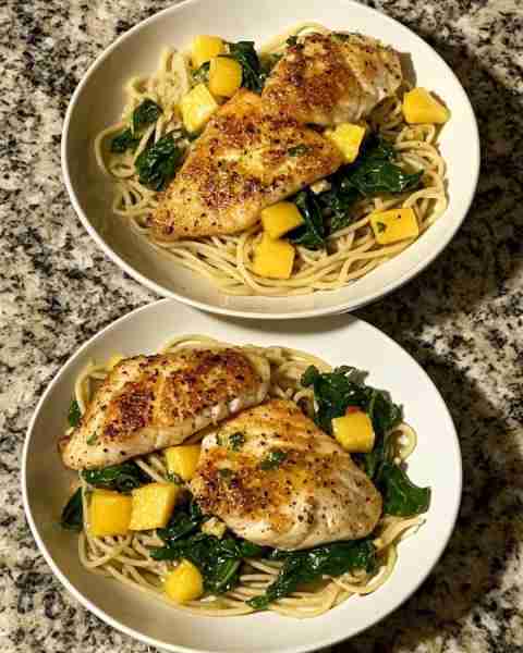 Mango Lime Tilapia with Spinach Pasta Zesty Mango-Lime Tilapia over Wilted Spinach Fettuccine Ingred...