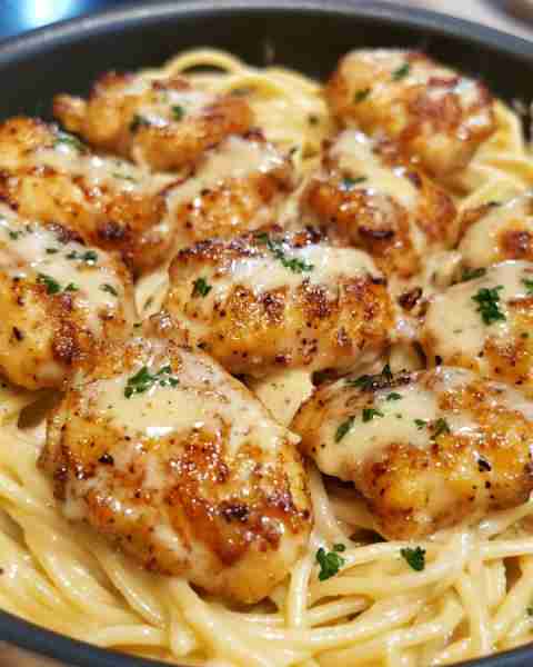 Creamy Parmesan Pasta with Sautéed Garlic Butter Chicken Ingredients: For the Chicken Bites: 1 lb bo...