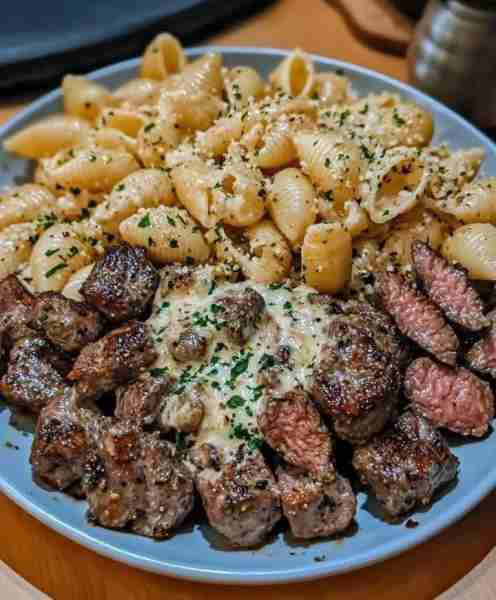 Garlic Butter Steak Bites & Creamy Parmesan Shells Ingredients: For the steak bites: - 1 lb sirloin...