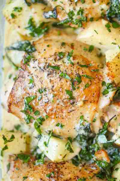 Chicken and Potatoes with Garlic Parmesan Cream Sauce - Crisp-tender chicken baked to absolute perfe...