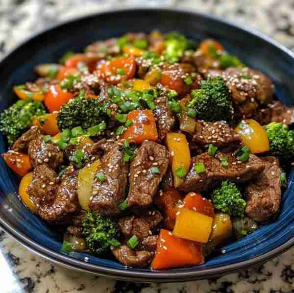 This Beef Stir Fry is ready in just 25 minutes – full of flavor and so easy! 🥩🥦🍚 Ingredients: - 1...