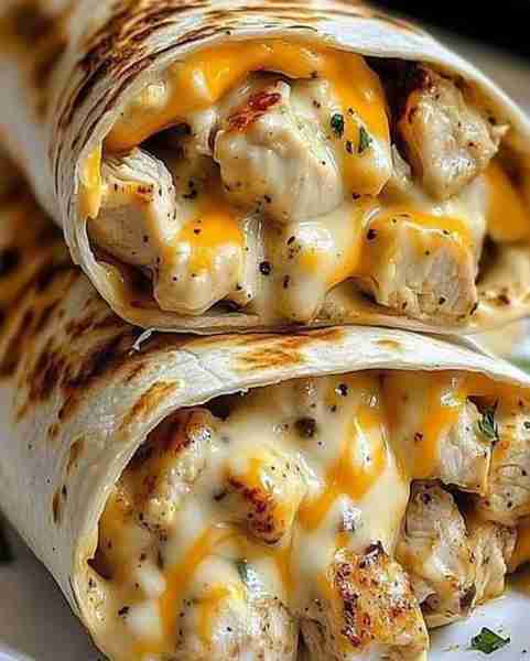 Cheesy Garlic Chicken Wraps Ingredients and Quantity For the Chicken: 2 boneless, skinless chicken b...