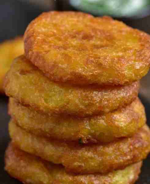 "These crispy air fryer mashed potato cakes with garlic and Parmesan make a super easy appetizer or...