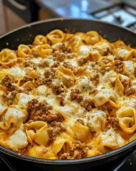 CAJUN BEEF TORTELLINI SKILLET IN PARMESAN CREAM Ingredients: 1 lb ground beef 12 oz cheese tortellin...