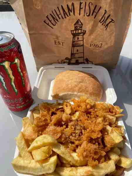Chippy chips with batter, salt and vinegar with a bread bun in the garden.Beautiful day 😎