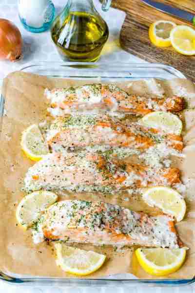 This Oven Baked Salmon with Lemon Cream Sauce recipe is simply mouthwateringly GOOOOOD! <3 Your Din...