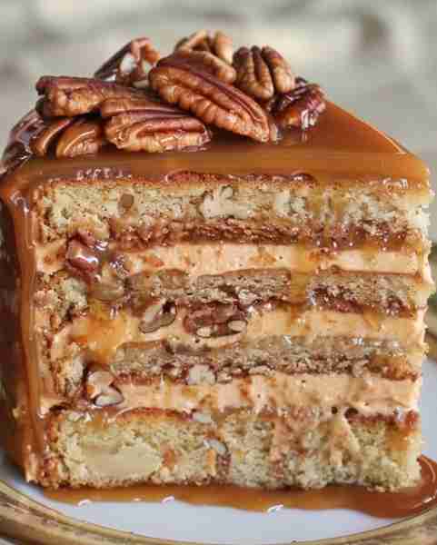 Southern Pecan Caramel Cake 🎂 Ingredients: 2 1/2 cups all-purpose flour 2 cups granulated sugar 1 c...