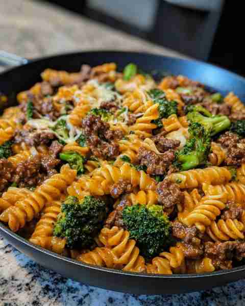 CHEESY CAJUN BEEF & BROCCOLI PASTA SKILLET Ingredients: 12 oz rotini pasta 1 lb ground beef 2 tbsp o...