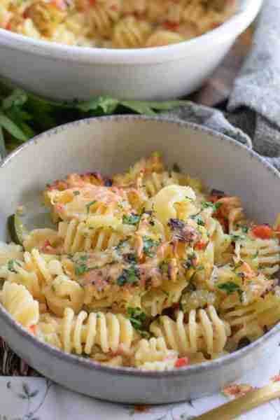 This Fusilli Pasta Bake with Bacon and Zucchini is a great comfort meal! Tender pasta noodles wrappe...