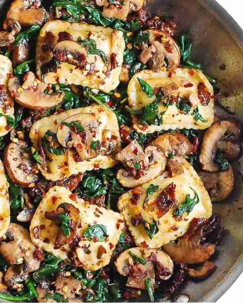 Cheese Ravioli with Spinach, Mushrooms, Sun-Dried Tomatoes, and Garlic. There is no better way to dr...