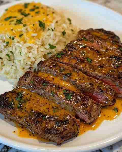 Smoky Cajun Steak with Cheesy Garlic Butter Rice Ingredients: 1 lb ribeye or sirloin steak, cut into...