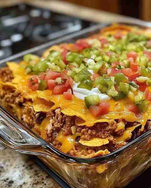 Try this Walking Taco Casserole – a fun twist on taco night that's easy to make and packed with flav...