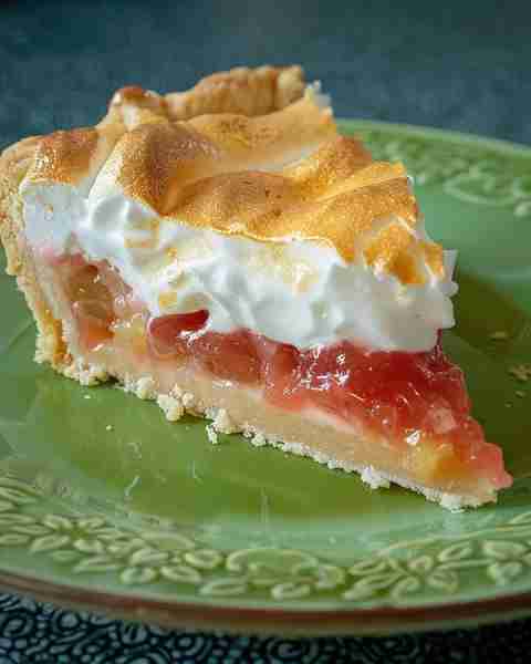 Dave's Rhubarb Custard Pie with Meringue 🥧🍋 Ingredients: For the Pie: 1 unbaked pie crust (9-inch)...
