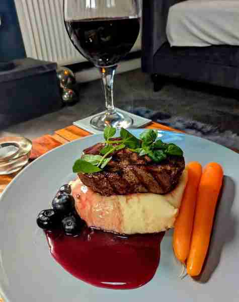 Fillet steak with a blueberry and red wine sauce.. by Mark M
