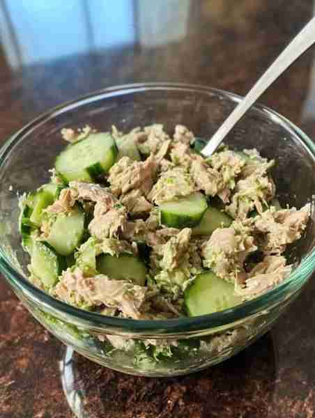 Power lunch. 1 can tuna, 1 green onion, 1 baby cucumber, 1 avocado, 1 TBS balsamic vinegar and a das...