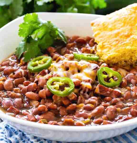 This Slow Cooker Spicy Pinto Beans recipe turns an inexpensive pound of pinto beans into a delicious...