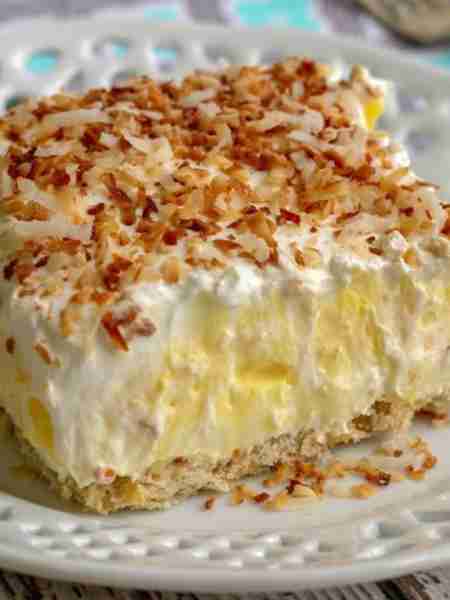 "The nutty crust on this Coconut Cream Pie Deluxe is the real stand-out in this recipe along with th...