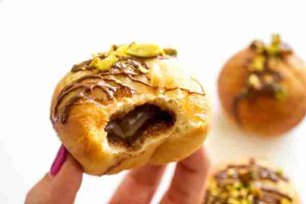 Headed into the weekend with a dozen of these babies. https://dashofsanity.com/nutella-donut-recipe/