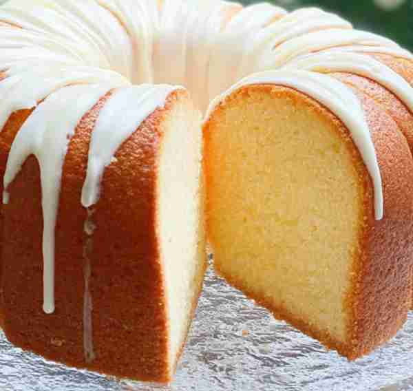 Moist Butter Pound Cake with Glaze recipe that stays rich and soft, topped with a sweet, slightly cr...