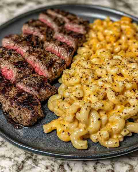 STEAK BITES WITH CAJUN MAC & PARMESAN BUTTER SAUCE Ingredients: 1 lb steak (sirloin or ribeye), cut...