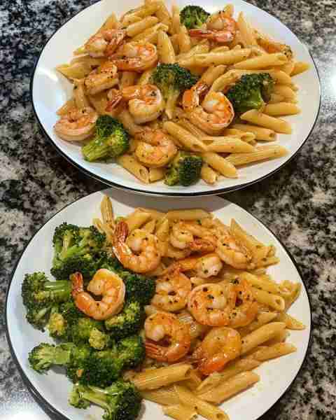 Garlic Butter Shrimp with Broccoli Penne Creamy Garlic Butter Shrimp Penne with Steamed Broccoli Ing...