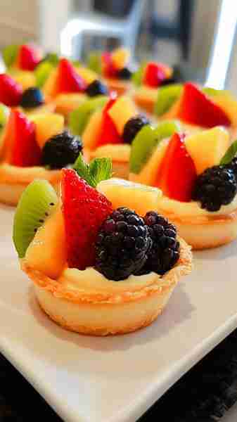 Mini Fruit Tarts with Italian Pastry Cream Makes: About 12 mini tarts Prep Time: 45 mins Chill Time:...
