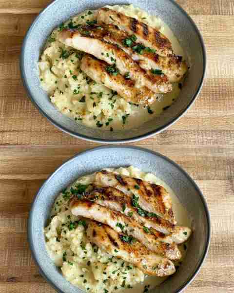 Creamy Cauliflower Alfredo with Grilled Chicken Velvety Cauliflower Alfredo Pasta with Herbed Grille...