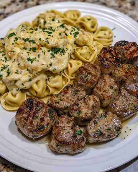 Garlic Butter Steak Paired with Creamy Cheesy Alfredo Tortellini Ingredients: For the Steak: 2 ribey...