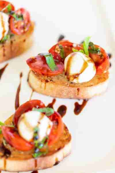 This easy Mozzarella Bruschetta is the ultimate summer appetizer—fresh, cheesy, and bursting with fl...
