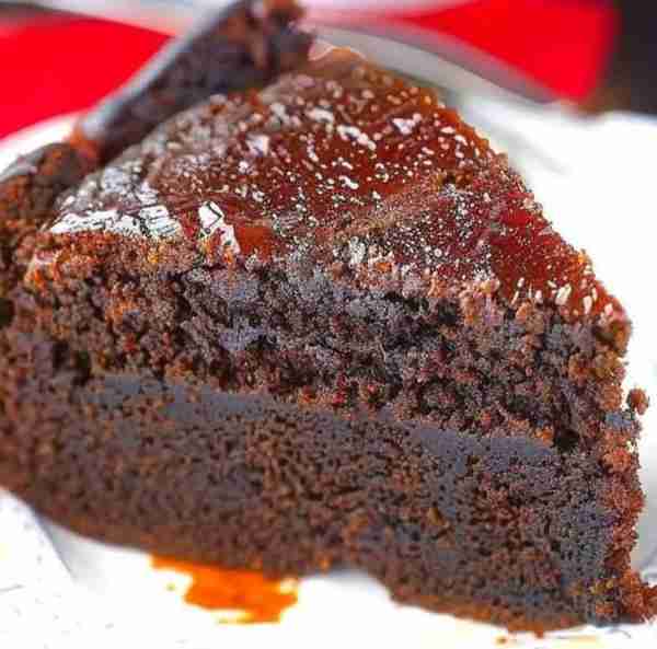 Black Cake, also known as rum cake or fruitcake, is a traditional Caribbean dessert, especially popu...
