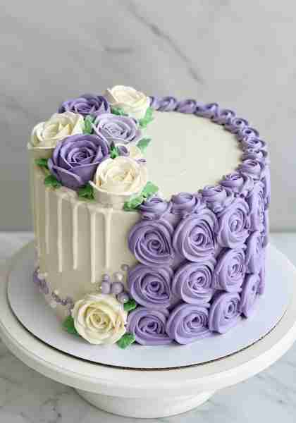 Buttercream Rose Cake🎂🌹, beautifully decorated with yellow frosting in intricate rose patterns and...