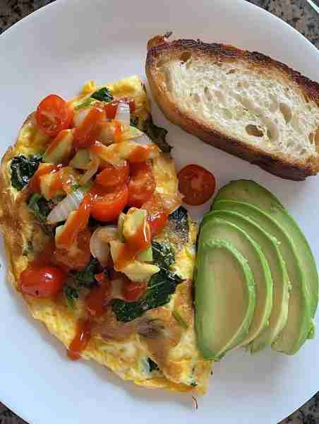 Veggie Omelette with Avocado & Sourdough Toast 🥑🍞 A nutritious and satisfying breakfast packed wit...