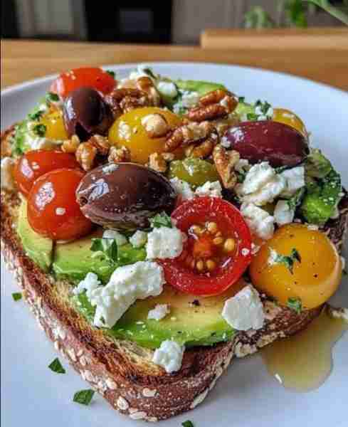 🥑 Avocado Toast with Feta, Cherry Tomatoes, Cranberries & Walnuts An exciting twist on classic avoc...