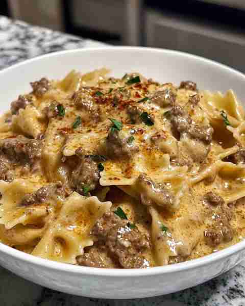 Creamy Parmesan Garlic Beef Bowtie Pasta Ingredients: 1 lb ground beef 3 teaspoons olive oil 5-6 c...