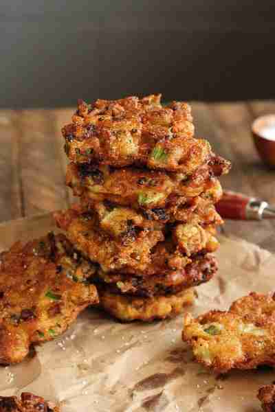 This easy recipe for Okra and Green Tomato Fritters brings together the best of fried okra and fried...