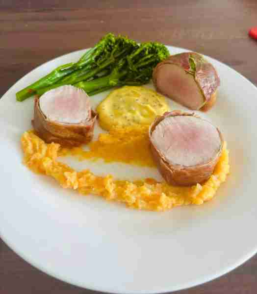 Medium cooked pork loin wrapped in sage and prosciutto. With root mash, tenderstem and a mustard cre...