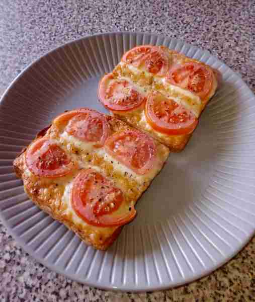 Cheese and fresh toms on toast by Craig