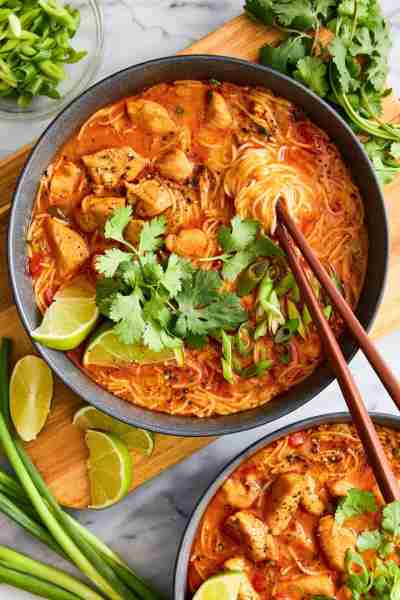 Thai Red Curry Noodle Soup - So much better than takeout! Packed with bites of tender chicken, rice...