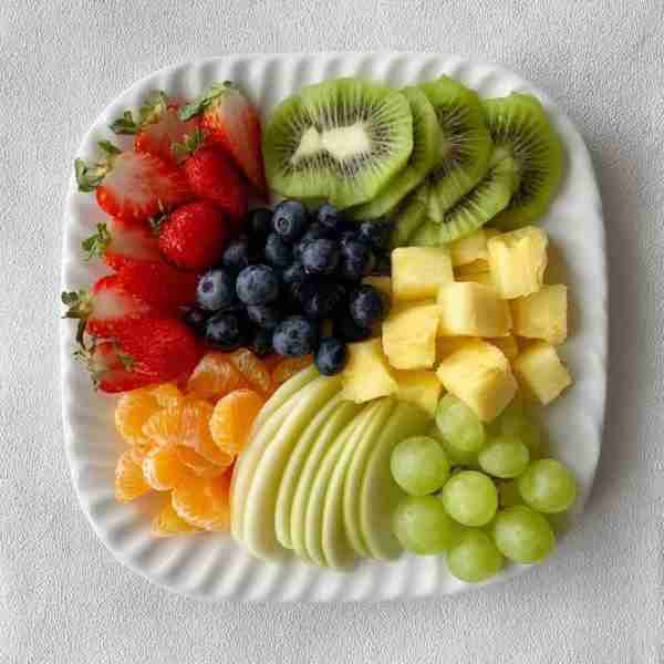 Colorful Fresh Fruit Platter Ingredients (as shown): Fresh strawberries (halved) Kiwi (sliced) Blueb...