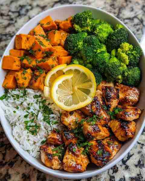 🍋 Epic Lemon Herb Chicken Power Bowl 🥦🍠🔥 Prep Time: 15 minutes Cooking Time: 20 minutes Servings...
