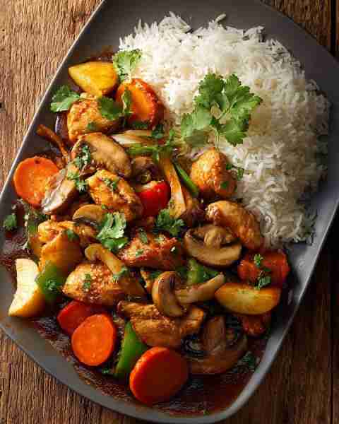 🔥 Ultimate Chicken Veggie Stir-Fry with Garlic Soy Glaze & Rice 🍚🥢 Prep Time: 15 mins Cook Time:...