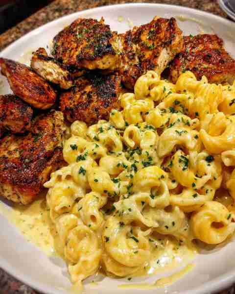 Cajun Garlic Chicken Cavatappi with Velveeta Alfredo Cream Ingredients: 1 lb chicken breasts, cut in...