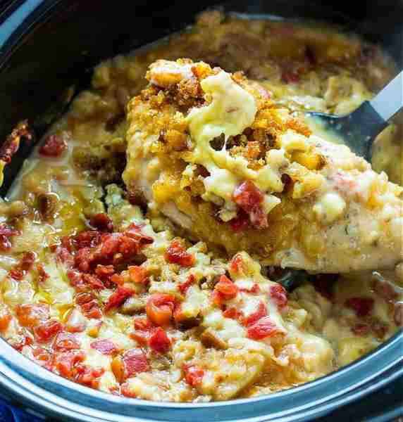 Crock Pot Cheesy Stuffing Chicken is sooo incredibly delicious. Chicken breasts are slow cooked with...