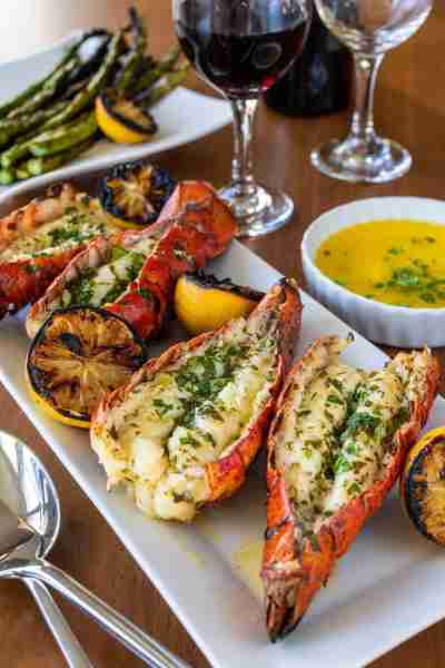 Grilled Lobster Tails Classic fire grilled lobster tails basted in a lemon garlic butter. Ingredient...
