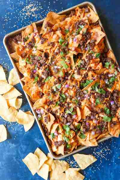 Korean Beef Nachos - These will be the BEST NACHOS of your life! Topped with everyone's favorite Kor...