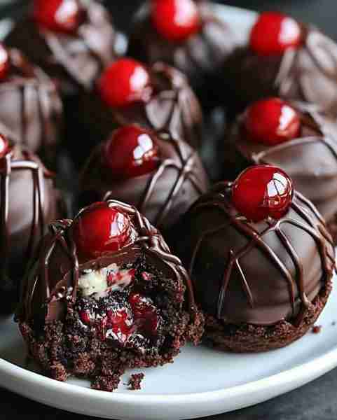 🍒 Black Forest Cookie Dough Brownie Bombs Recipe 🍪🍫 Ingredients: 1 box of brownie mix (or homemad...