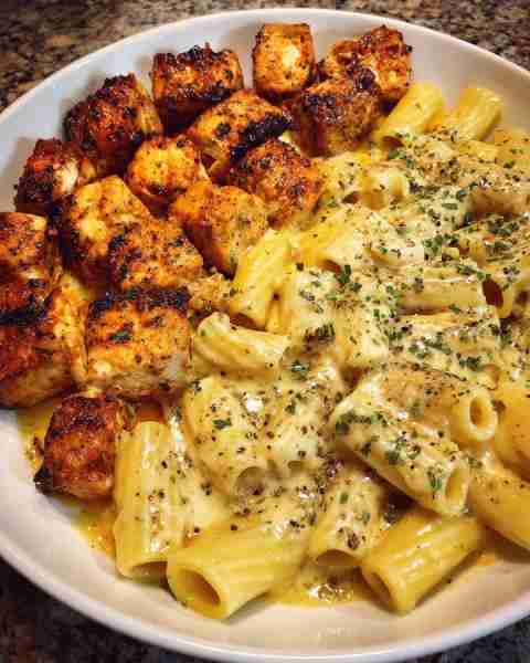 Spicy Cajun Cheddar Chicken with Creamy Penne Alfredo Ingredients: 1.5 lbs boneless, skinless chicke...