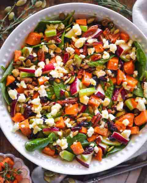 🍠🍏🍎 Roasted Sweet Potato Salad with spinach, apples, dried cranberries, pecans, pumpkin seeds, fe...