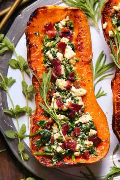 🍁 Stuffed Butternut Squash with Feta Cheese, Spinach, and Bacon. 🍁 The feta cheese stuffing is sea...